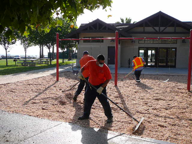 People working on a playground